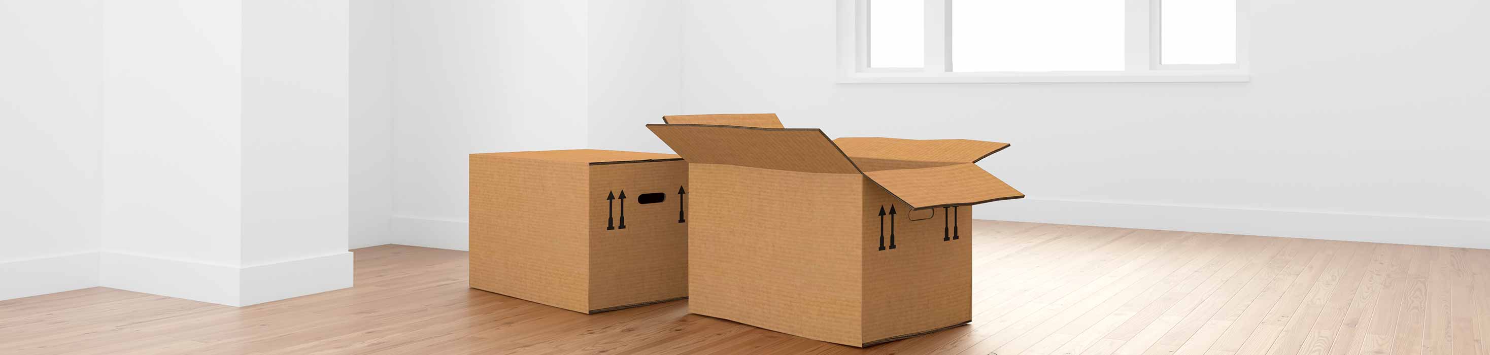 image of clean vacant room in home with move-in boxes